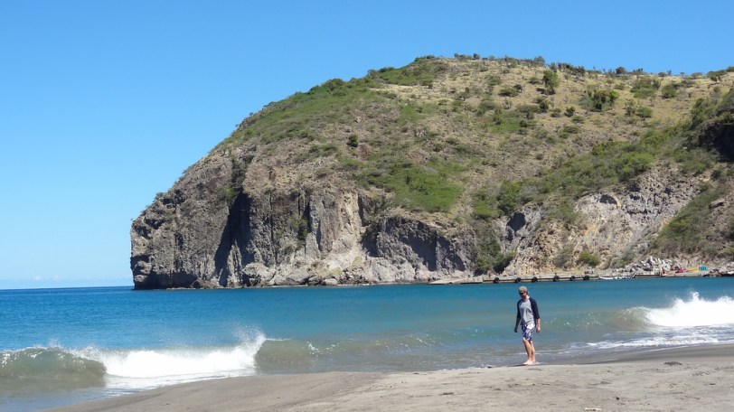 The black sand beach at Little Bay