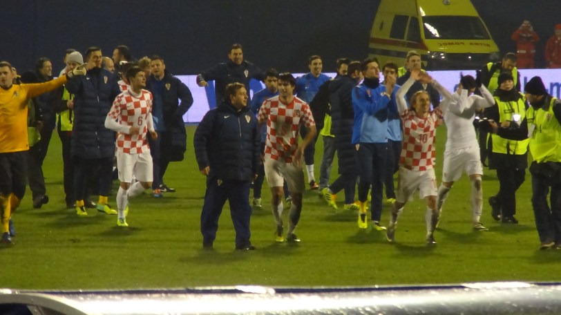 The Croatian team celebrates their World Cup berth. That's Real Madrid's Luka Modrić on the right, arguably Croatia's most well-known player. 