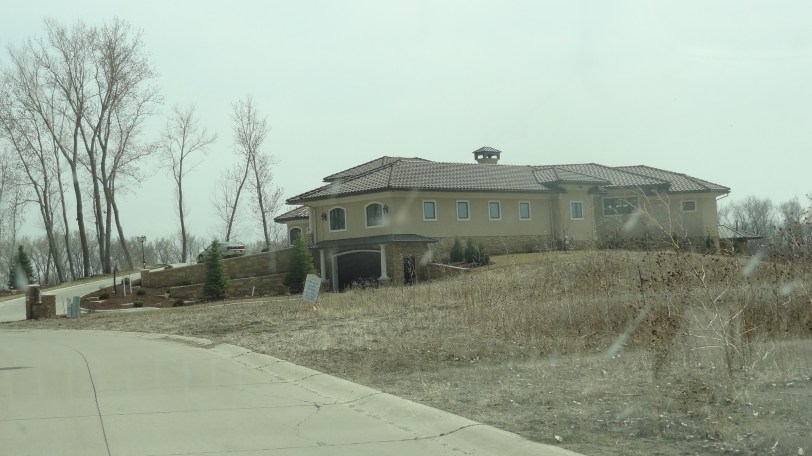 The southernmost point of South Dakota lies beyond yonder house, mateys! It be inaccessible to us mere geonerds!