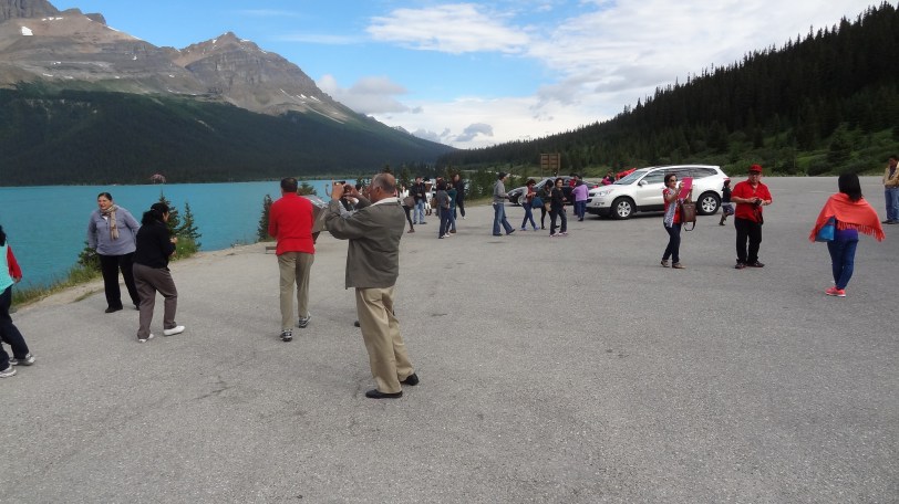 ...and here's all the tourists around me at Bow Lake trying to take similar shots. This is a pretty light crowd compared to some sights, but be prepared to deal with a few crowds, especially closer to Banff. 