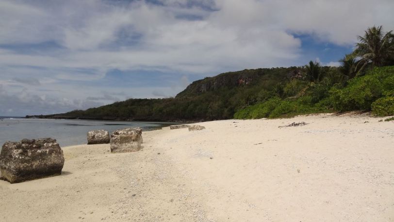 Wing Beach, with some (WWII-era?) relics scattered on the shore