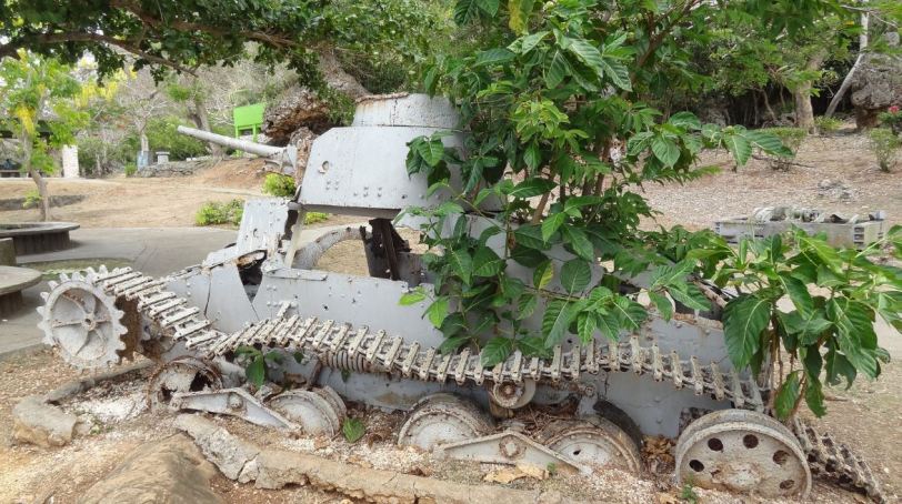 A Japanese tank, overcome now by the Earth, sits at Marpi Point park