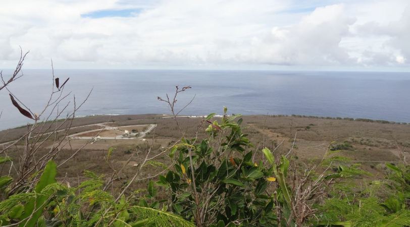 View from Suicide Cliff, Banzai Cliff appears at the very north end. A memorial cemetery is to the left. 