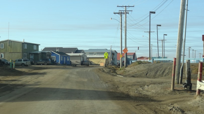 Typical road in Barrow. Pavement doesn't play nice with permafrost.